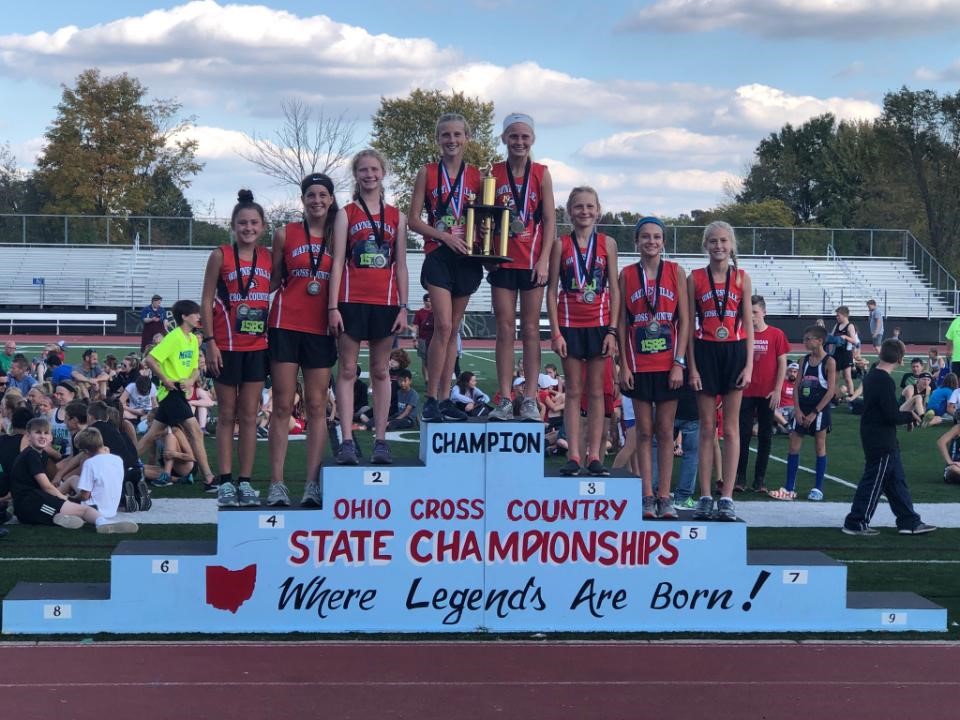 girls track winners on podium